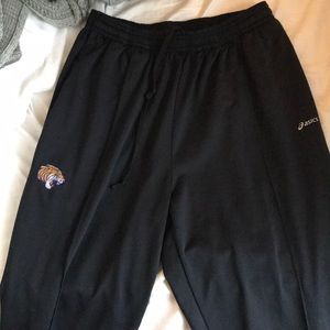 Track pants with zipper bottoms